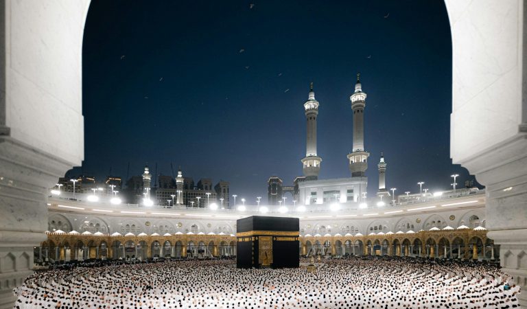 A breathtaking night view of pilgrims at the Kaaba in Masjid al-Haram, Makkah, Saudi Arabia.